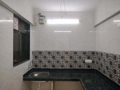 Kitchen Image of 700 Sq.ft 1 BHK Apartment / Flat for rent in Unnati Woods Phase 7, Kasarvadavali Thane for Rs. 17000