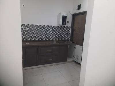 Kitchen Image of 850 Sq.ft 2 BHK Apartment / Flat for sale in Bramhacorp The Collection W1, Wadgaon Sheri Pune for Rs. 11200000