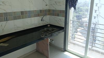 Kitchen Image of 826 Sq.ft 2 BHK Apartment / Flat for sale in Om 1st Phase Of Paraiso, Mothi Desai Gaon Thane for Rs. 7200000