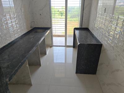 Kitchen Image of 1050 Sq.ft 2 BHK Apartment / Flat for rent in Neelkanth Exotica, Dronagiri Navi Mumbai for Rs. 15000