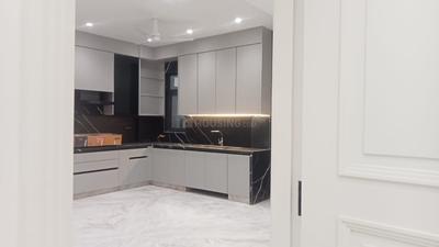 Kitchen Image of 2025 Sq.ft 4 BHK Builder Floor for rent in Janakpuri New Delhi for Rs. 100000