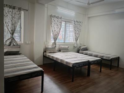 Bedroom Image of TRINETRA BOYS HOSTEL/PG in Kothrud, Pune