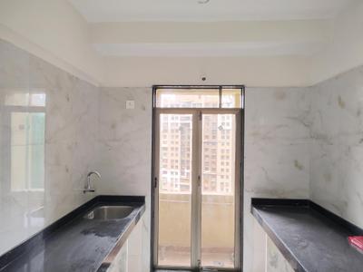 Kitchen Image of 700 Sq.ft 1 BHK Apartment / Flat for rent in Cosmos Empress Park, Kasarvadavali Thane for Rs. 17000