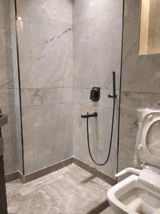 Common Bathroom Image of 2400 Sq.ft 4 BHK Builder Floor for sale in Pitampura New Delhi for Rs. 60000000