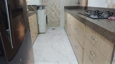 Kitchen Image of 1500 Sq.ft 4 BHK Apartment / Flat for sale in Poddar Shri Ganesh Apartments, Goregaon West Mumbai for Rs. 35000000