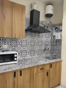 Kitchen Image of 580 Sq.ft 1 RK Builder Floor for rent in Sector 39 Gurgaon for Rs. 24000