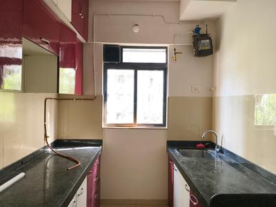 Kitchen Image of 624 Sq.ft 1 BHK Apartment / Flat for sale in Lodha Palava Downtown, Palava Phase 2 Thane for Rs. 3100000