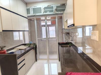 Kitchen Image of 675 Sq.ft 1 BHK Apartment / Flat for rent in Parth Lakeview, Dighe Thane for Rs. 40000