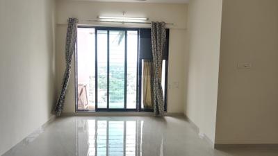 Living Room Image of 1230 Sq.ft 2 BHK Apartment / Flat for rent in Gagangiri Om Gagangiri Laxman Tower, Dahisar West Mumbai for Rs. 56000