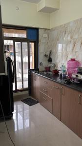 Kitchen Image of 695 Sq.ft 1 BHK Apartment / Flat for sale in Pranjee Garden City, Badlapur East Badlapur for Rs. 3000000