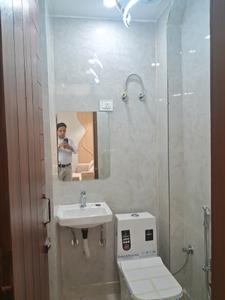 Common Bathroom Image of 600 Sq.ft 2 BHK Builder Floor for sale in Dwarka Mor New Delhi for Rs. 4000000