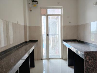 Kitchen Image of 825 Sq.ft 2 BHK Apartment / Flat for sale in Marathon Nexzone, Kudave Navi Mumbai for Rs. 7250000