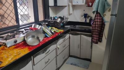 Kitchen Image of 900 Sq.ft 2 BHK Apartment / Flat for sale in Kopar Khairane Navi Mumbai for Rs. 13500000