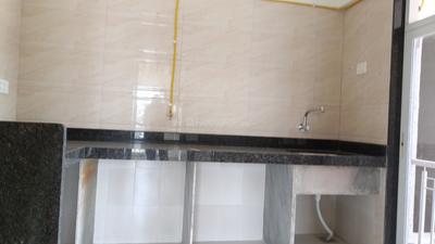 Kitchen Image of 990 Sq.ft 2 BHK Apartment / Flat for sale in Bhagwati Belmont, Kasarvadavali Thane for Rs. 8999999
