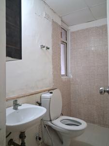 Common Bathroom Image of 950 Sq.ft 2 BHK Apartment / Flat for sale in Jaypee Kosmos, Sector 134 Noida for Rs. 7200000