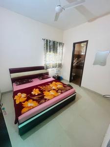 Bedroom Image of Kalra Hotel &amp; PG in Lohgarh, Zirakpur