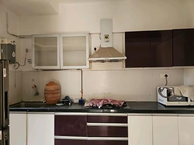 Kitchen Image of 784 Sq.ft 1.5 BHK Apartment / Flat for sale in Long Island, Charholi Budruk Pune for Rs. 5200000
