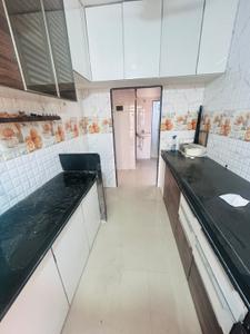 Kitchen Image of 656 Sq.ft 1 BHK Apartment / Flat for rent in Thakurli Thane for Rs. 18000
