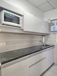 Kitchen Image of 435 Sq.ft 1 RK Apartment / Flat for rent in Paramount Golfforeste Villas, Surajpur Greater Noida for Rs. 15000