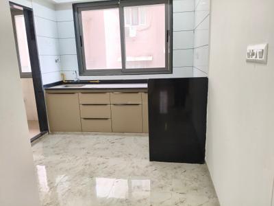 Kitchen Image of 1300 Sq.ft 3 BHK Apartment / Flat for sale in Shwetsom Stavam Residency, Gota Ahmedabad for Rs. 9200000