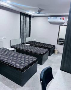 Bedroom Image of Sanjay PG in Kamla Nagar, New Delhi