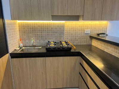Kitchen Image of 640 Sq.ft 1 RK Studio for rent in Lodha Belmondo, Gahunje Pune for Rs. 45000