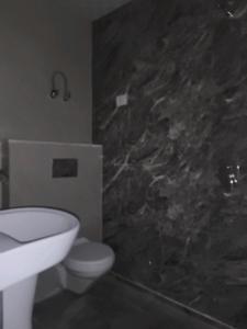 Common Bathroom Image of 1050 Sq.ft 2 BHK Apartment / Flat for sale in Vihaan Wardania, Noida Extension Greater Noida for Rs. 4599450