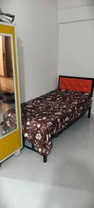 Bedroom Image of NAVKAR PG in Andheri East, Mumbai