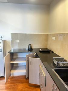 Kitchen Image of 500 Sq.ft 1 RK Apartment / Flat for rent in Thanisandra Bengaluru for Rs. 21000