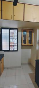 Kitchen Image of 950 Sq.ft 2 BHK Apartment / Flat for rent in Dhankawadi Pune for Rs. 14000