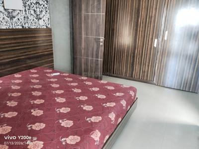 Bedroom Image of 1310 Sq.ft 2 BHK Apartment / Flat for rent in Happy Home Nandanvan 3, Vesu Surat for Rs. 32000