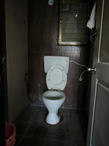 Common Bathroom Image of 583 Sq.ft 2 BHK Apartment / Flat for rent in Arihant Anshula, Taloja Navi Mumbai for Rs. 18000