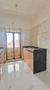 Kitchen Image of 1050 Sq.ft 2 BHK Apartment / Flat for rent in Puraniks Home Town, Kasarvadavali Thane for Rs. 29000