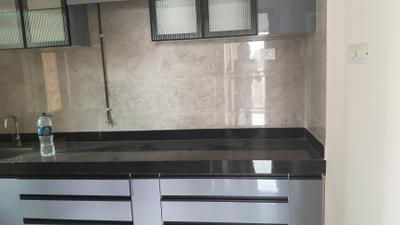 Kitchen Image of 820 Sq.ft 2 BHK Apartment / Flat for sale in Sheth Auris Bliss, Malad West Mumbai for Rs. 21000000