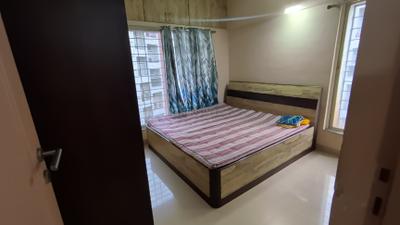 Bedroom Image of 916 Sq.ft 2 BHK Apartment / Flat for rent in Ratan Prestige, Kharadi Pune for Rs. 33000