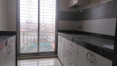 Kitchen Image of 750 Sq.ft 1 BHK Apartment / Flat for rent in Niharika Absolute, Kharghar Navi Mumbai for Rs. 24000
