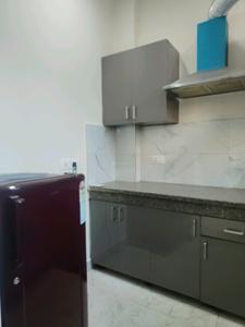 Kitchen Image of 600 Sq.ft 1 BHK Builder Floor for rent in Sector 52A Gurgaon for Rs. 29000