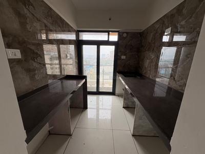 Kitchen Image of 1000 Sq.ft 2 BHK Apartment / Flat for sale in Radhe Mohan, Kopar Khairane Navi Mumbai for Rs. 16500000
