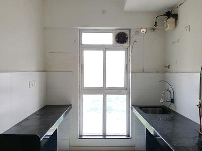 Kitchen Image of 700 Sq.ft 1.5 BHK Apartment / Flat for rent in Godrej Emerald, Kasarvadavali Thane for Rs. 26000