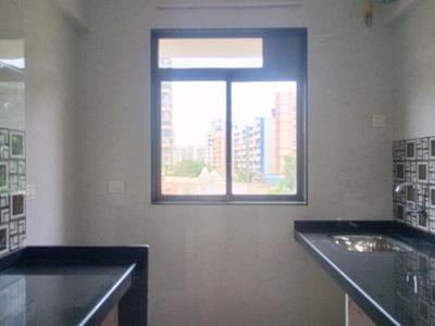 Kitchen Image of 725 Sq.ft 1 BHK Apartment / Flat for sale in Krishna Ultima, Kalyan East Kalyan for Rs. 4400000