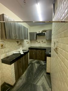 Kitchen Image of 900 Sq.ft 2 BHK Builder Floor for rent in Ramesh Nagar New Delhi for Rs. 34000