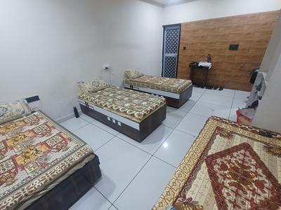 Bedroom Image of Sarthana PG House in Nana Varachha, Surat