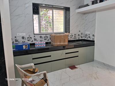 Kitchen Image of 850 Sq.ft 2 BHK Apartment / Flat for sale in Talegaon Dabhade Pune for Rs. 4200000