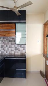 Kitchen Image of 900 Sq.ft 2 BHK Apartment / Flat for rent in Goel Hill Shire, Wagholi Pune for Rs. 25000