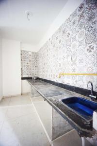 Kitchen Image of 2520 Sq.ft 3 BHK Apartment / Flat for sale in Laxmi Eternia, Narolgam Ahmedabad for Rs. 4500000