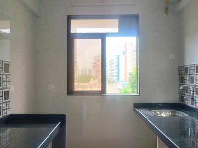Kitchen Image of 740 Sq.ft 1 BHK Apartment / Flat for sale in Thakurli Thane for Rs. 5700000