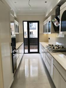 Kitchen Image of 2700 Sq.ft 3 BHK Builder Floor for sale in Sector 23A Gurgaon for Rs. 32600000