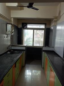 Kitchen Image of 950 Sq.ft 2 BHK Apartment / Flat for sale in Mohan Suburbia, Ambernath West Ambernath for Rs. 4200000