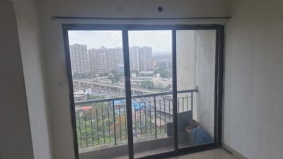 Balcony Image of 600 Sq.ft 1 BHK Apartment / Flat for sale in Man Opus, Mira Road East Mira Bhayandar for Rs. 7300000