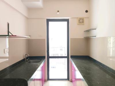 Kitchen Image of 690 Sq.ft 1.5 BHK Apartment / Flat for sale in Lodha Palava Downtown, Palava Phase 2 Thane for Rs. 4000000